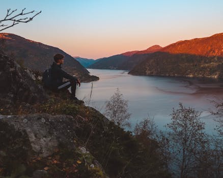 Backpacker enjoying a beautiful sunset