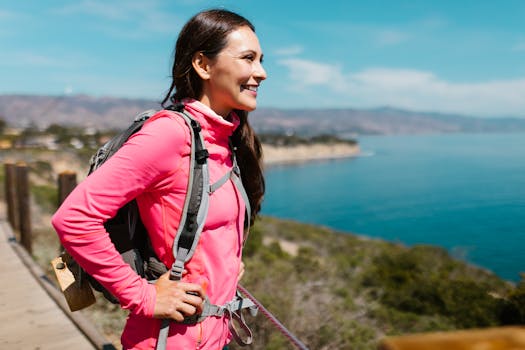 Happy backpacker exploring the mountains