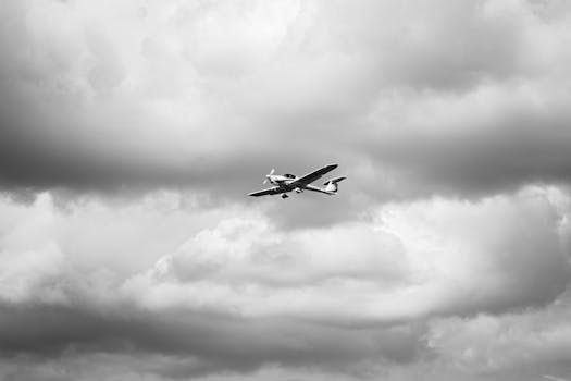 airplane flying over the clouds