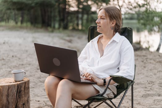 Digital nomad working from a beach