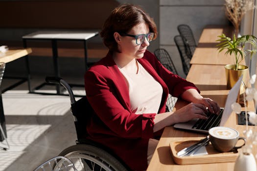 Freelancer working on a laptop in a café