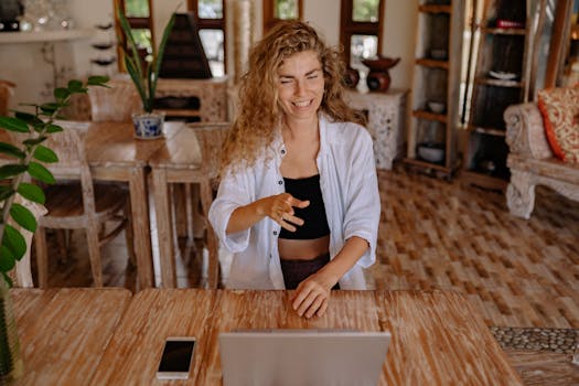 happy digital nomad working on a beach