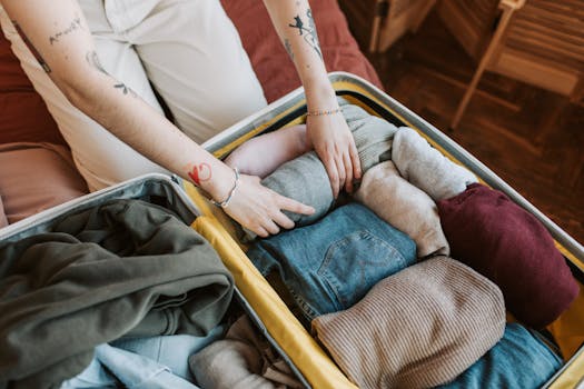 neatly packed suitcase with travel essentials